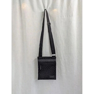 Dakine slim crossbody travel bag, black with white triangle pattern P5